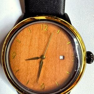 New Stylish black and gold watch - rare find